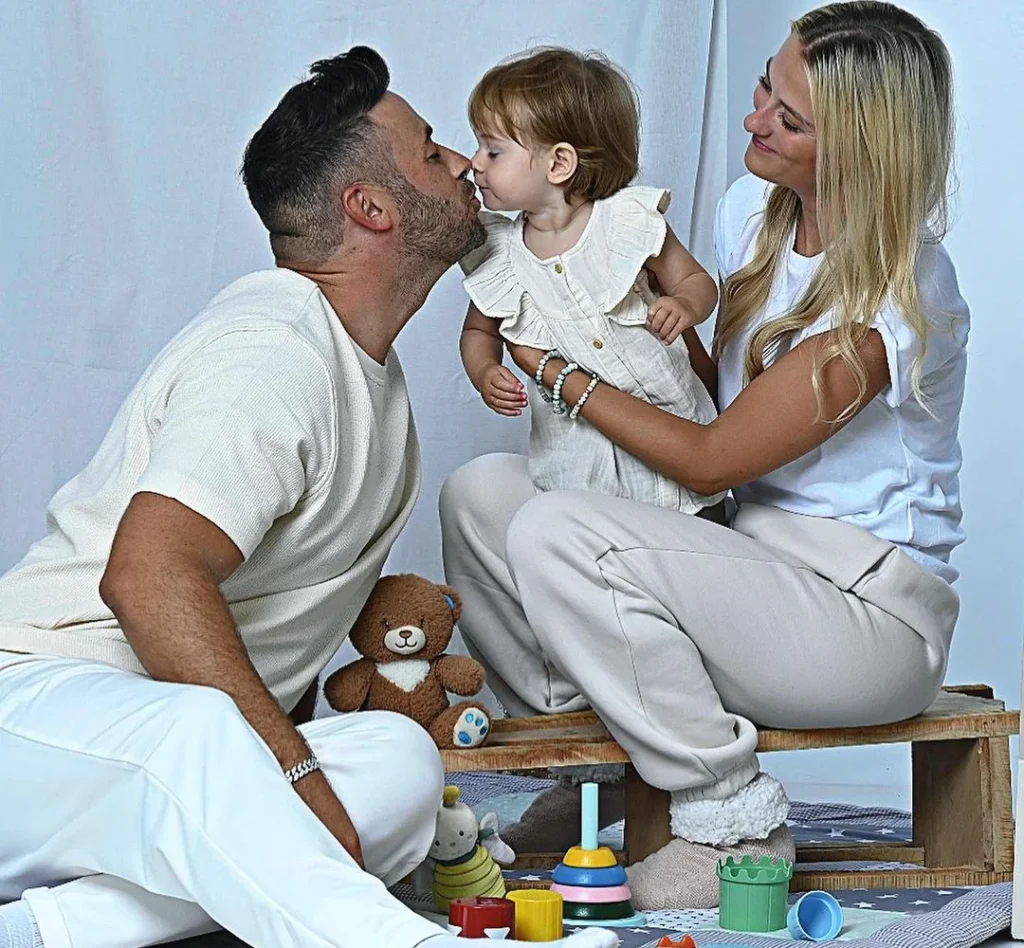 family using toys at a photoshoot for amazing family photos