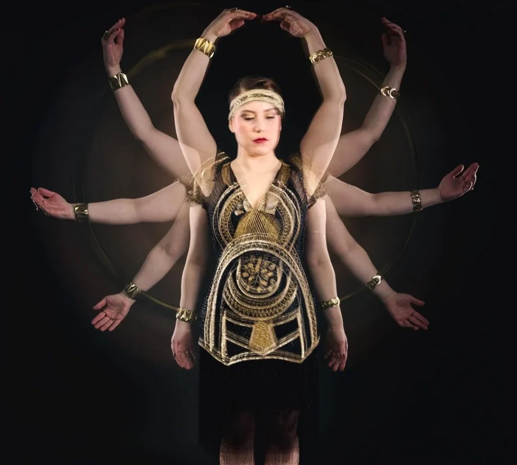 spiriual photo of a woman with multiple hands reaching over her head, shot with long exposure photography