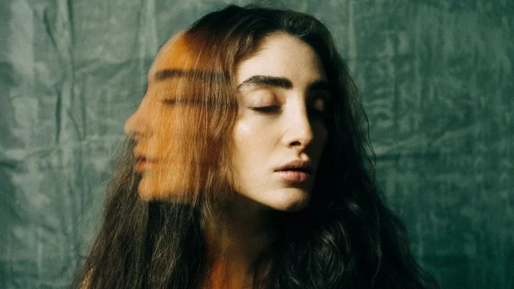 long exposure photography of a woman with two faces, closed eyes, great example of simplistic long exposure