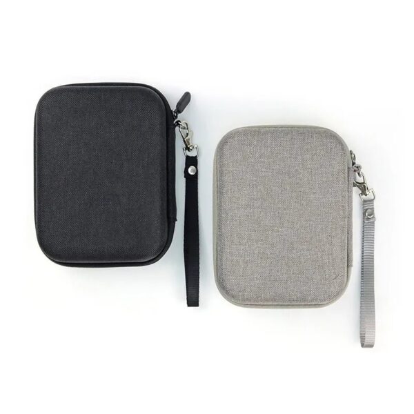 black and grey compact camera bag